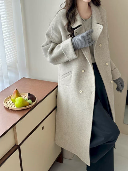 Peter Pan collar double-breasted double-faced wool coat in a classic tailored silhouette