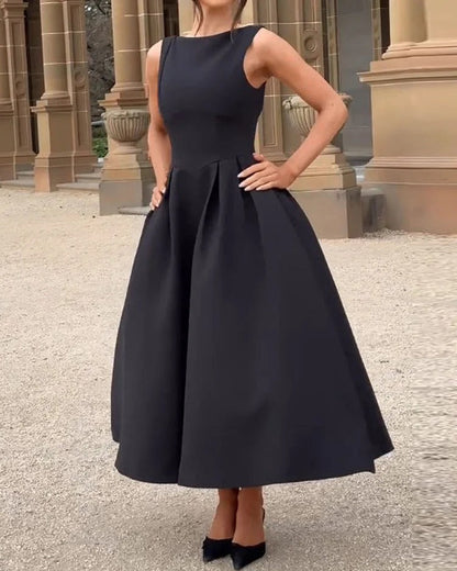 Women's sleeveless solid color hollow-out cinched dress in a fitted silhouette