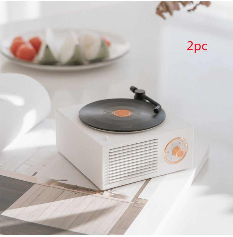 Wireless mini portable retro phonograph Bluetooth speaker in vintage record player design