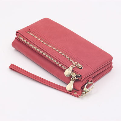 Chic women's long wallet by BACKUPMYFILESNOW® featuring urban style, with multiple card slots and a sleek leather finish.
