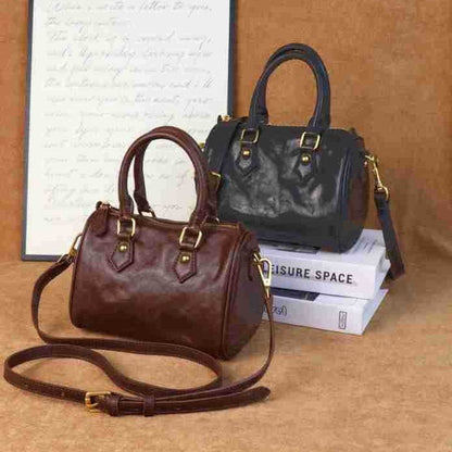 Boston-style sophisticated vintage handbag in a niche design with structured shape and classic detailing