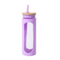 Clear glass water tumbler with silicone bamboo lid, reusable straw, and iced coffee bottle design by EasyOptionXY