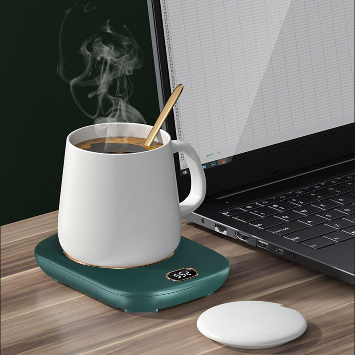 EasyOptionXY electric coffee mug warmer with digital display, USB connection, and three adjustable temperature settings on a desk.