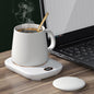 EasyOptionXY electric coffee mug warmer with USB, three temperature settings, auto shut-off, designed for desk use with a beverage cup.