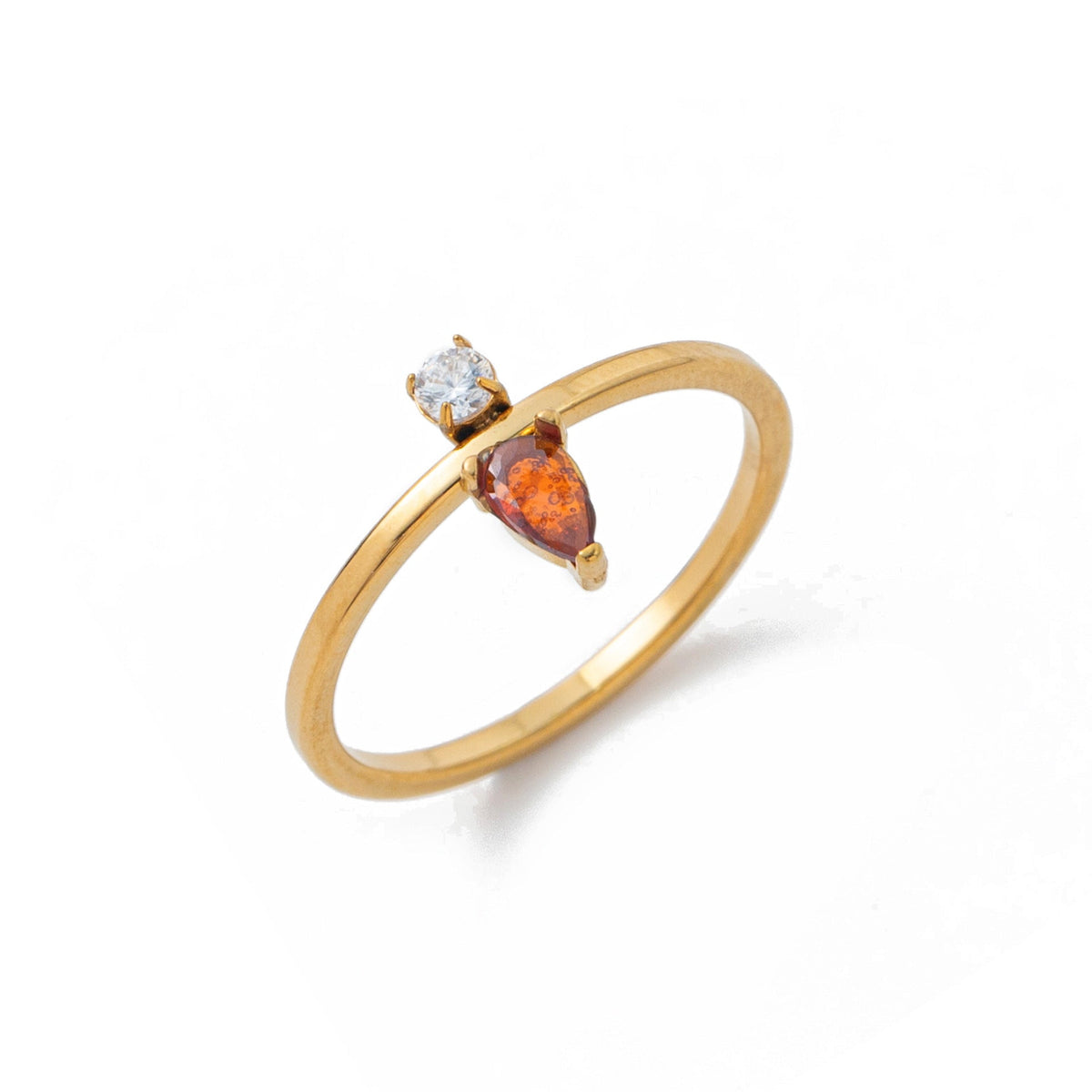 Stainless steel gold water-drop diamond ring with a sleek teardrop design