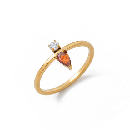 Stainless steel gold water-drop diamond ring with a sleek teardrop design