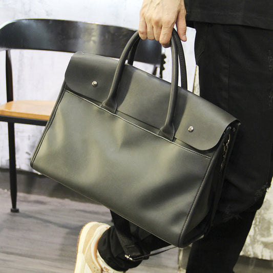 Fashionable briefcase business crossbody handbag in a structured design with an adjustable shoulder strap