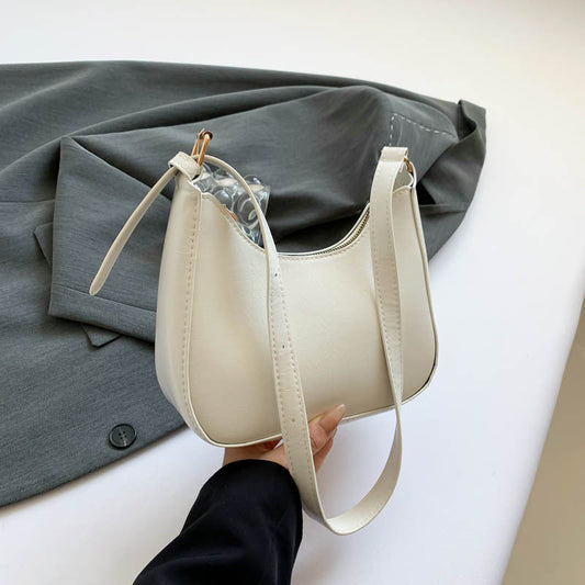 Women's solid-colored vintage fashion handbag, structured design with short handles