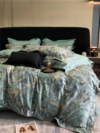 Long-staple cotton printed four-piece bedding set in soft, patterned fabric 񟿿