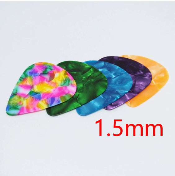 Folk Bakelite ukulele guitar pick in a classic compact design