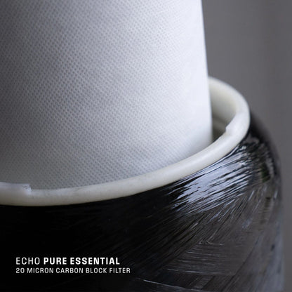 Close-up of Echo Water EchoPure1 whole home water filter unit with clear housing and filtration components visible.