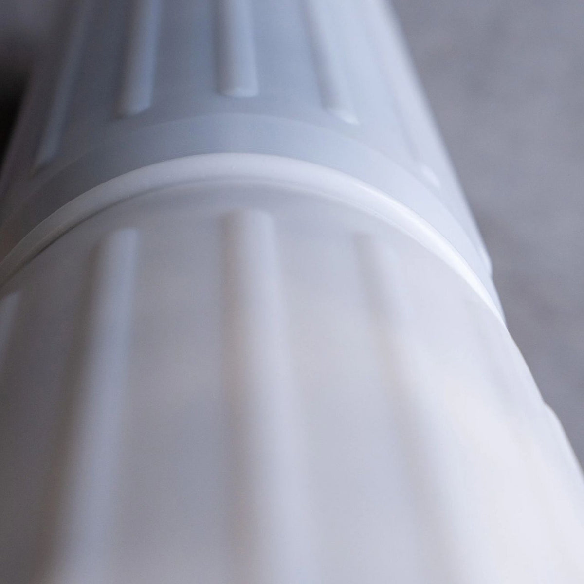 Close-up of Echo Water EchoPure3 whole home water filter showing its sleek design and filter components.