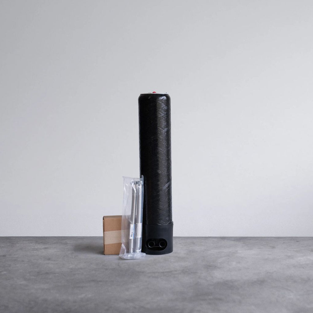 Close-up of Echo Water ECHO Whole Home Water Filter showing its sleek design and filter components.