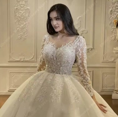 Luxurious Regal Sparkle Ball Gown Bridal Dress by EdleessFashion with intricate beadwork and flowing tulle skirt.