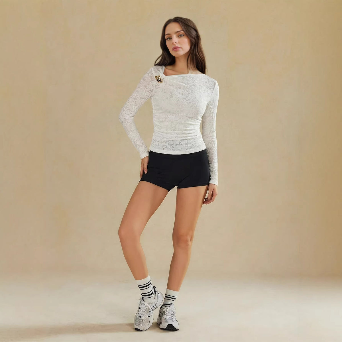 Women's versatile long-sleeve top with irregular sheer design in black<center>