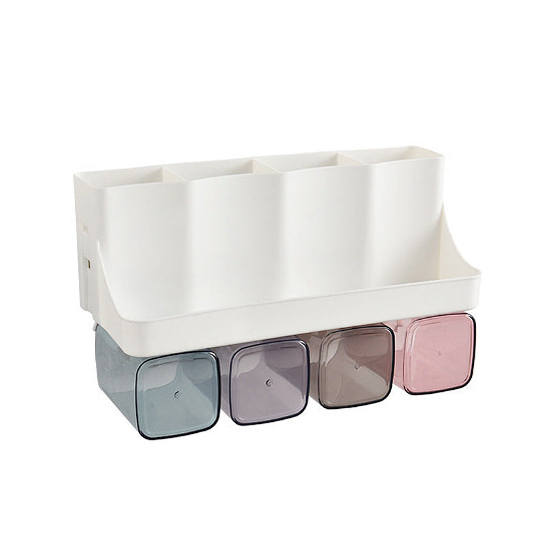 Perforation-free suction toothbrush holder and bathroom toiletry shelving set mounted on a wall