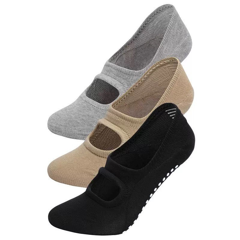 Women's yoga fitness floor socks with non-slip grip soles, close-up product view