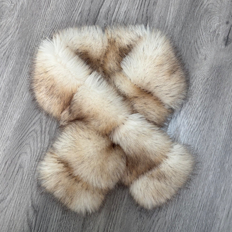 Segmented wool patchwork coat with plush materials, cross-knitted design and fur trim in a mature elegant style