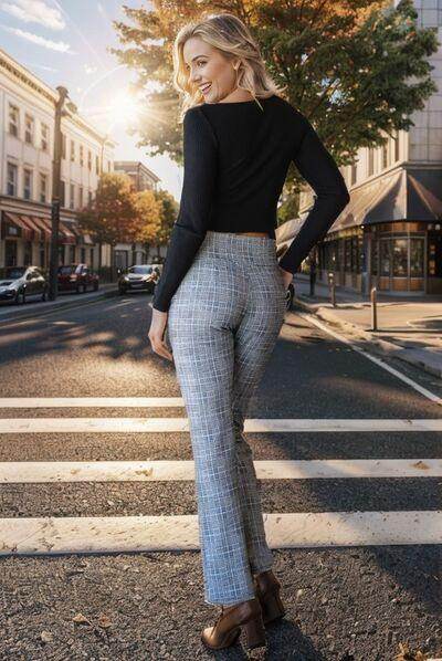 Heimish full size plaid flare pants with wide waistband, featuring a stylish pattern and comfortable fit in plus size.