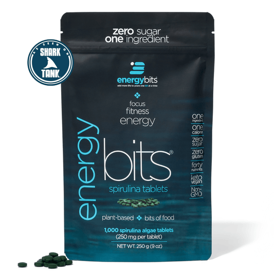Large bag of ENERGYbits® Spirulina, organic green algae supplement in a resealable package, ideal for health and energy boost.