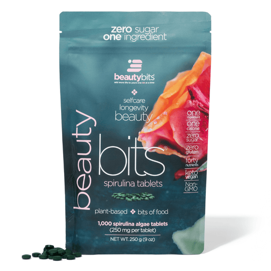 Large bag of ENERGYbits BEAUTYbits® Spirulina supplement, showing the green, powdered superfood in a resealable bag.