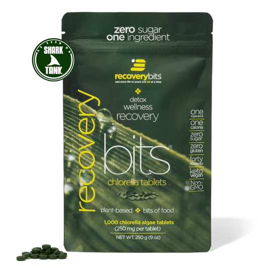 Large bag of ENERGYbits RECOVERYbits® Chlorella supplement in a subscription package, featuring green chlorella tablets in a resealable bag.