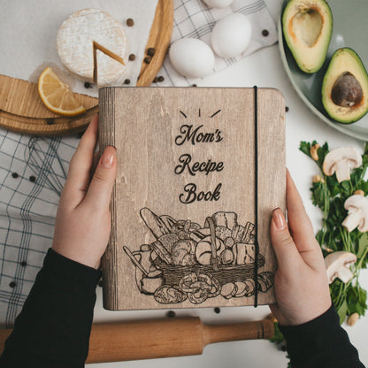 Enjoy The Wood recipe book basket with a cozy, organized container holding a recipe book and cooking accessories.