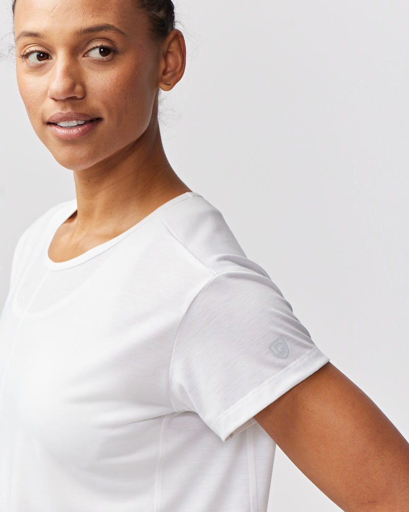 White Goal Five G5 Everyday Women's Performance Workout Top for training, shown from side view.