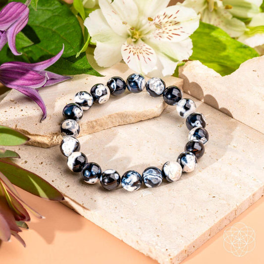 Exotic Orca Agate bracelet by Conscious Items featuring deep healing properties and intricate natural stone details.