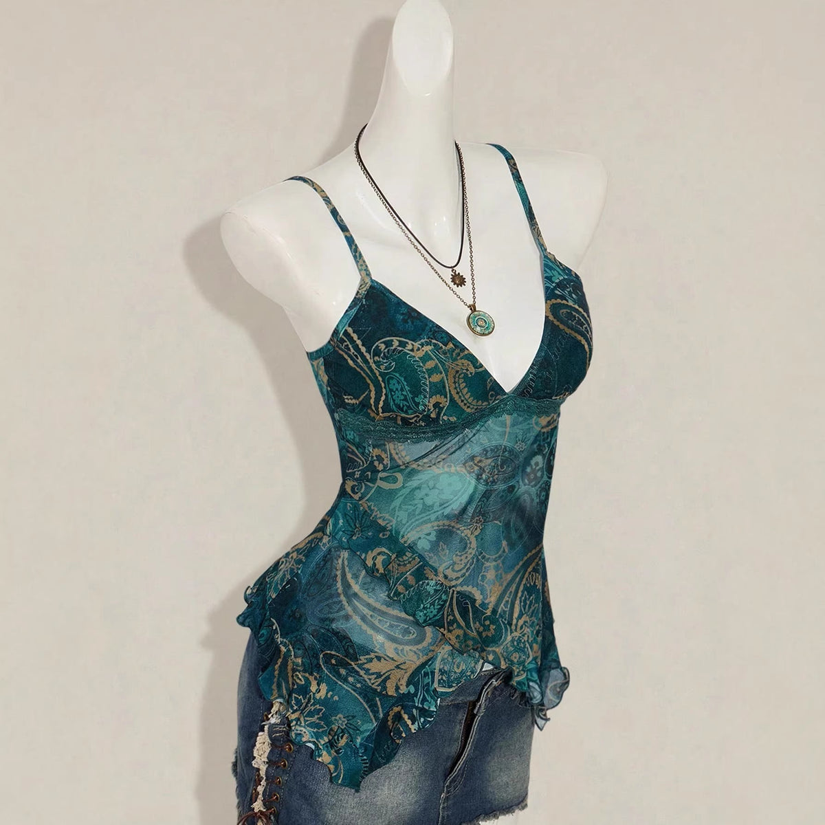 Floral-print mesh top with a figure-flattering fit and sheer long sleeves