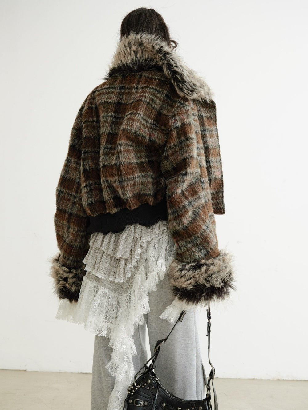 Women's reversible plaid PU leather jacket, showing plaid and faux leather sides