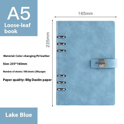 A5 loose-leaf removable notepad for business office meetings, shown open with lined pages and ring binding