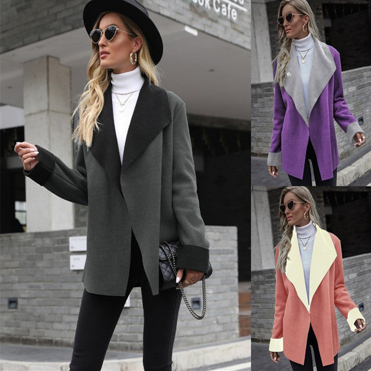 Notch-lapel contrast-color long-sleeve wool blazer in a structured design