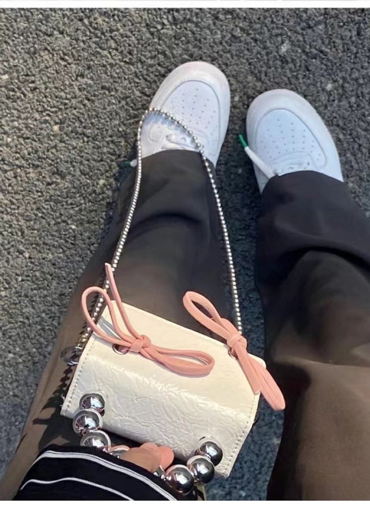 Textured cute bow mini chain handbag in a compact design with a decorative bow and chain strap
