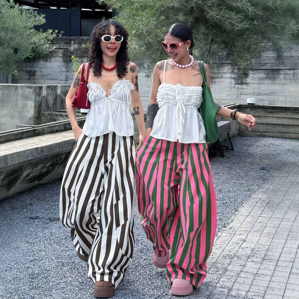 Women's loose-fitting high-waisted wide-leg pants, front view in a fashionable style