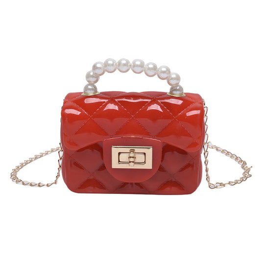 Pearl hand one-shoulder crossbody chain children's bag in a compact design