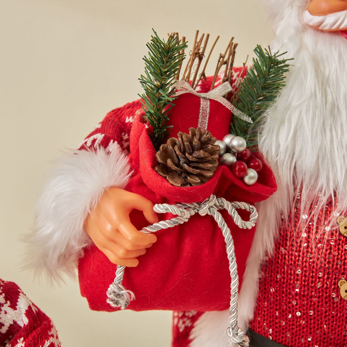 Christmas doll ornaments decorations in festive outfits for holiday tree display