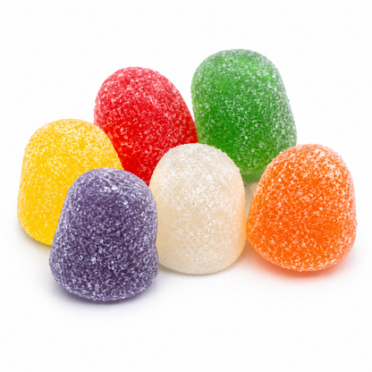 Assorted Sunrise Spice Drops gummy candies from Candy In Bulk in a clear plastic bag, colorful and chewy spice-flavored gummies.