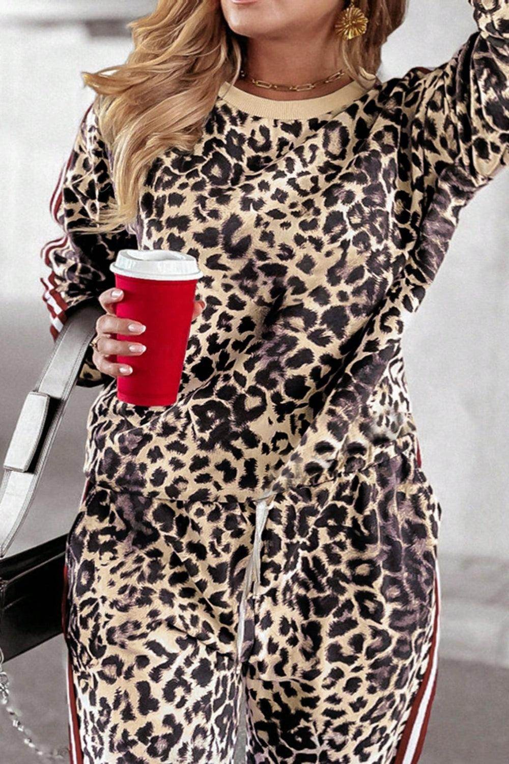 Plus size leopard print round neck top and pants set for women, stylish and comfortable trendy outfit by Trendsi.