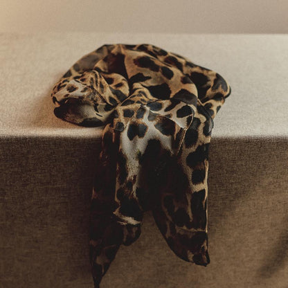 Spring lightweight narrow long silk scarf in a high-end design, displayed flat with water droplets