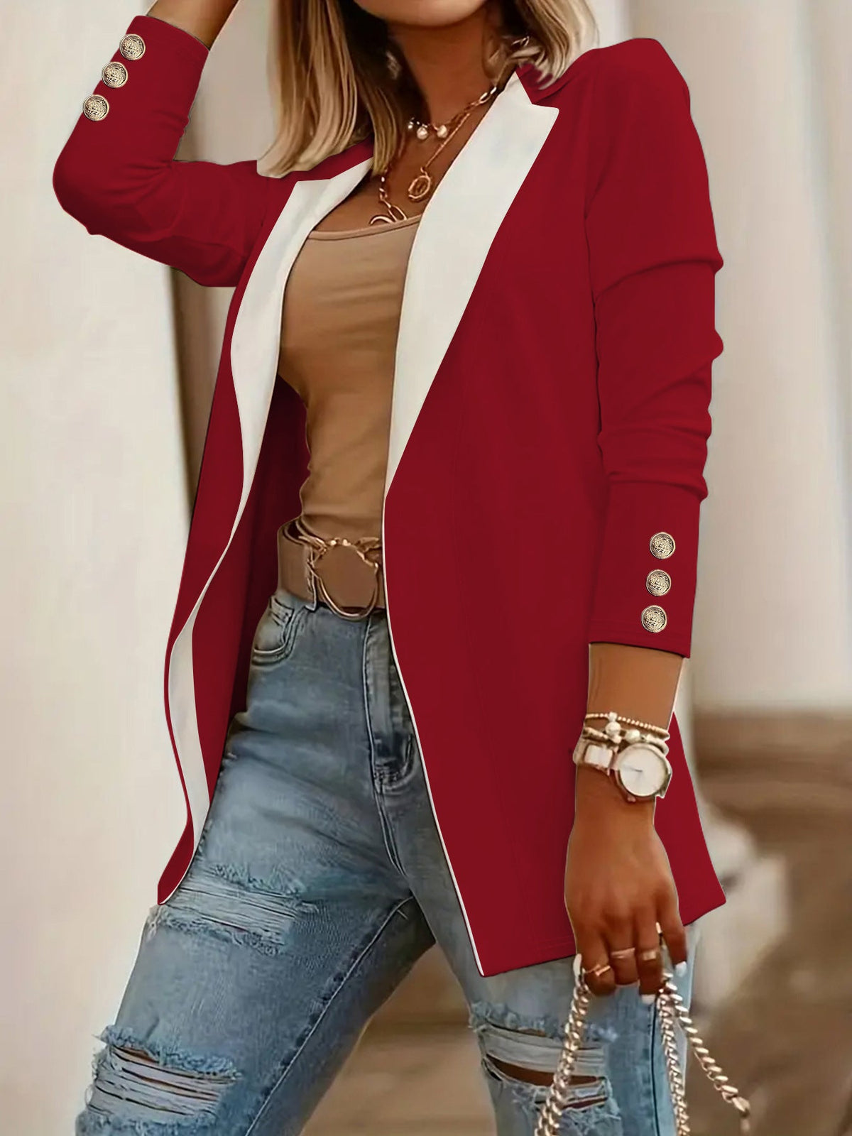 Notch-lapel contrast-color slim-fit long-button blazer with tailored silhouette and front button closure