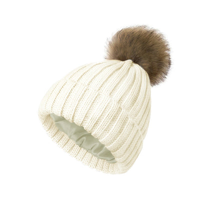 Women's solid-color brimmed hat with satin pom-pom, front view