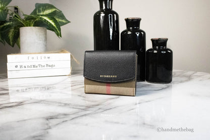 Burberry Luna black leather coin pouch wallet with house check pattern, featuring compact design and branded details.