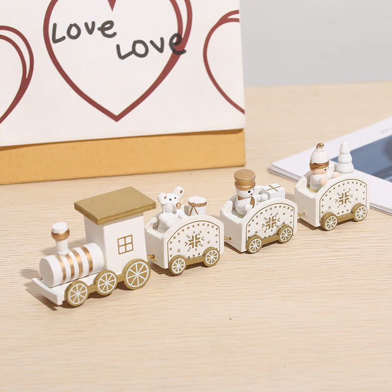 Wooden Christmas train decoration featuring festive holiday details in natural wood tones