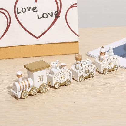 Wooden Christmas train decoration featuring festive holiday details in natural wood tones