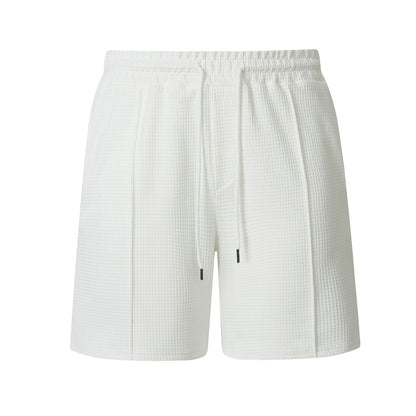 Men's drawstring loose-fit athletic shorts in a relaxed design with an adjustable waist.