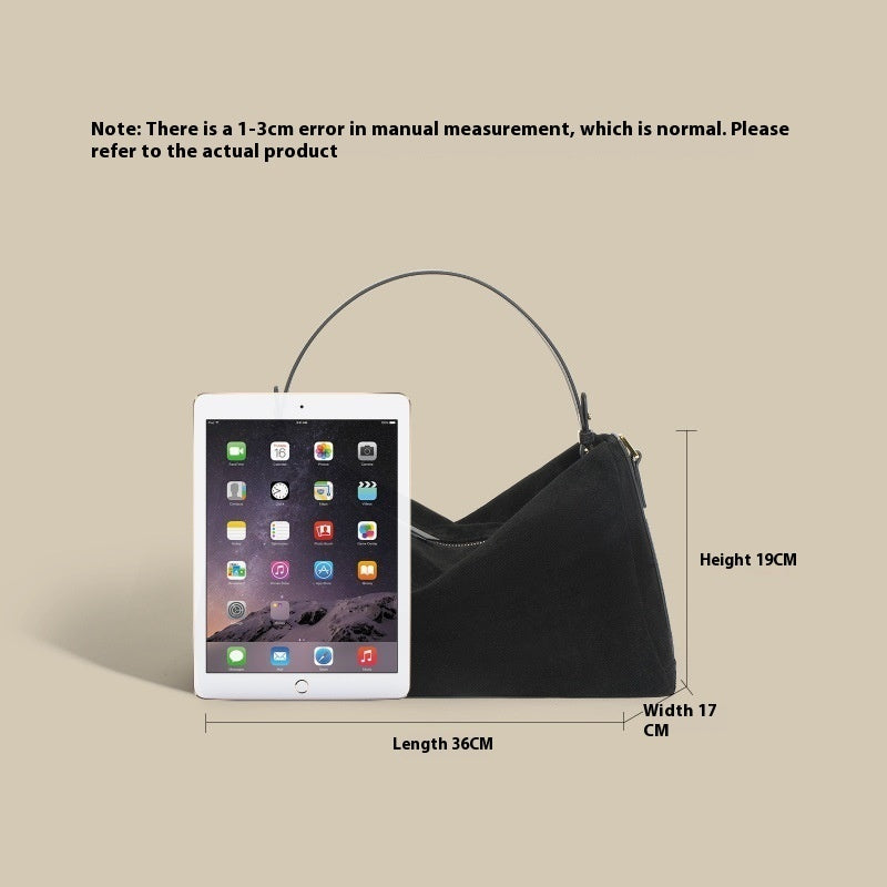 High-grade versatile cowhide handbag in a structured design with durable leather texture and spacious interior