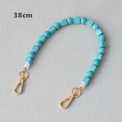 Vintage turquoise resin bag chain accessory close-up