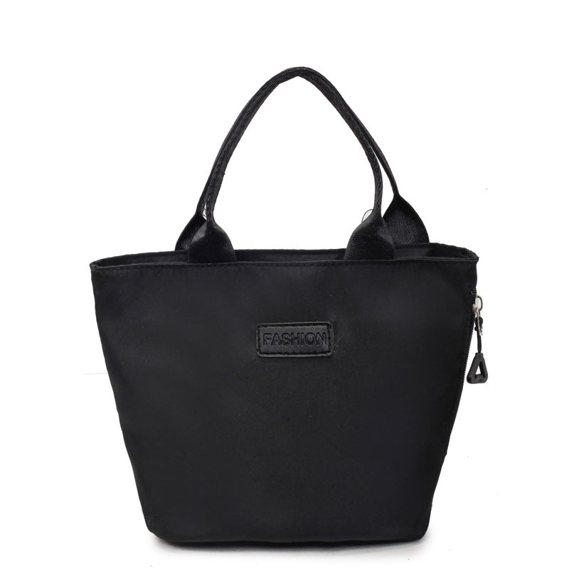 Fashionable women's casual fabric tote handbag, versatile commuter bag with spacious design