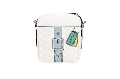 Coach Hudson 21 Medium Chalk Trompe L'oeil print handbag with top handles and logo details, showcasing its stylish design.